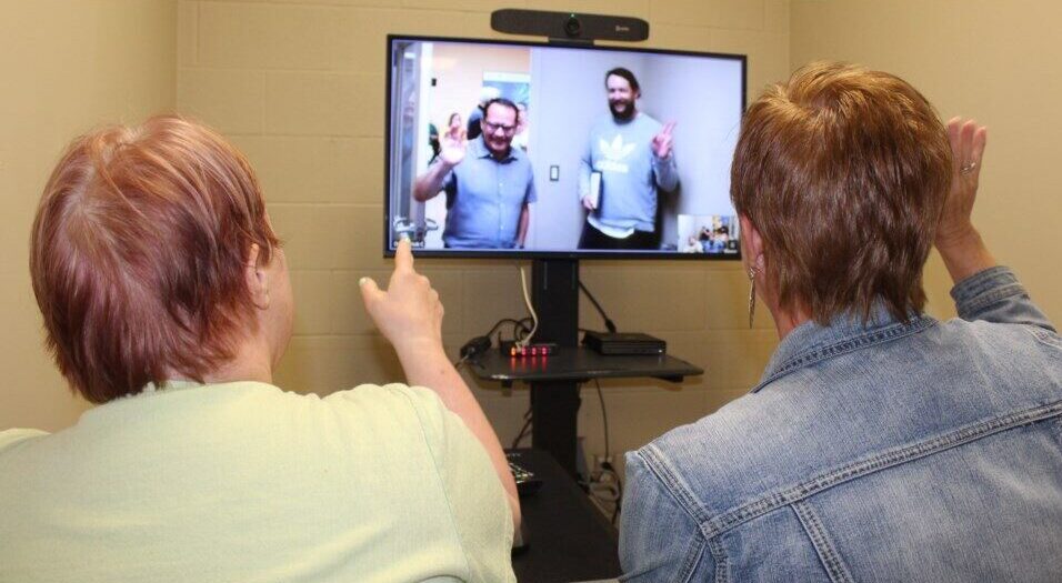 Testing out the technology in one of Community Living Guelph-Wellington's new digital hubs.