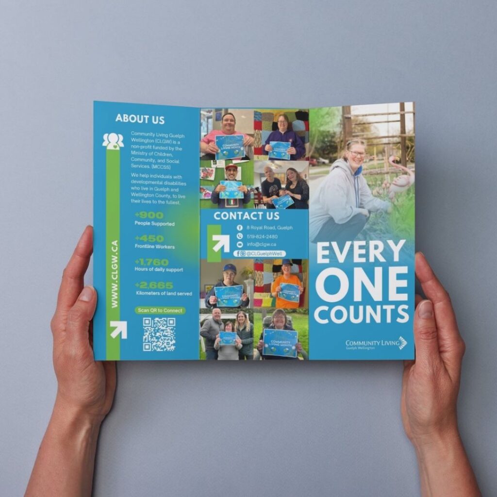 A person's hands are shown holding open the Everyone Counts Brochure